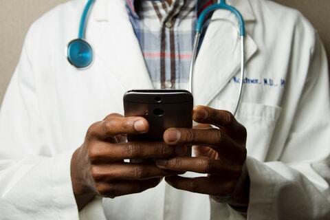 Medical Professional using a mobile phone