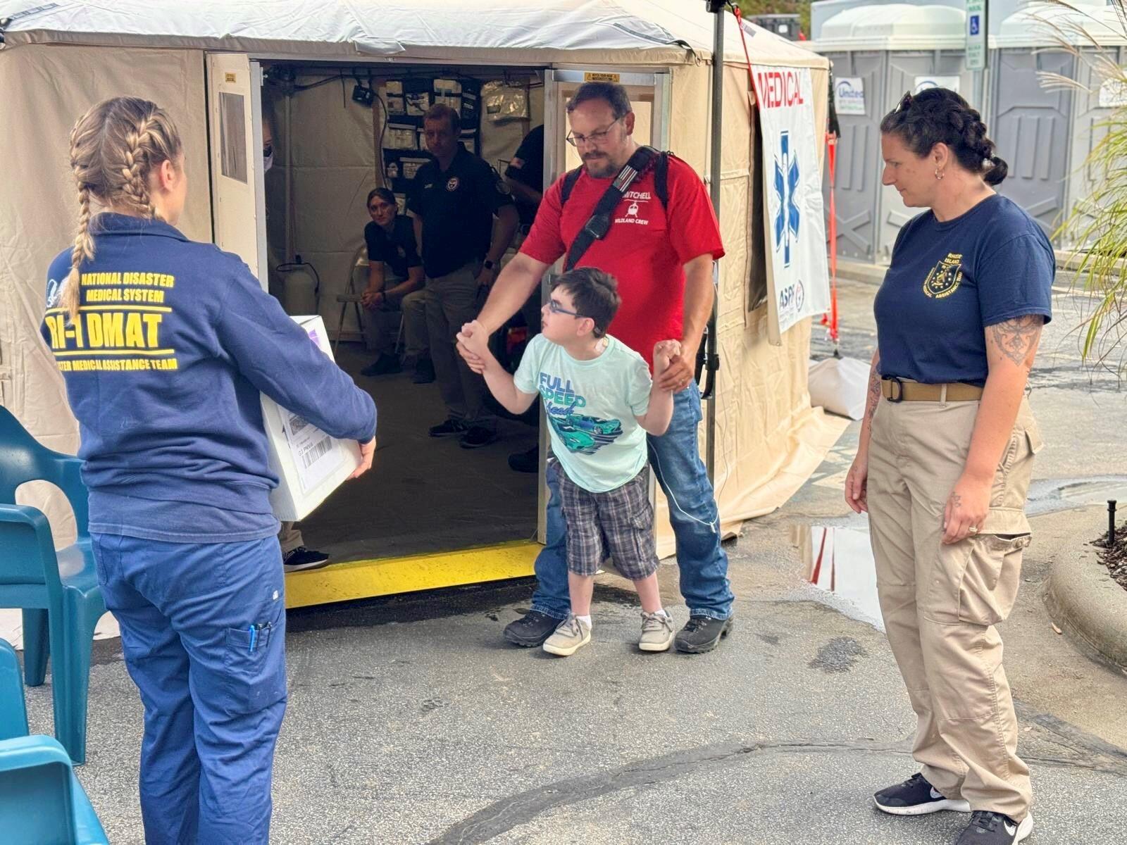 Following Hurricane Helene, ASPR's Jennifer Sawicky and Lindsey Corrente help Brandon Pitman get life-saving medication for his son Gabriel.