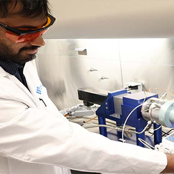 Lab Technician working at a desk