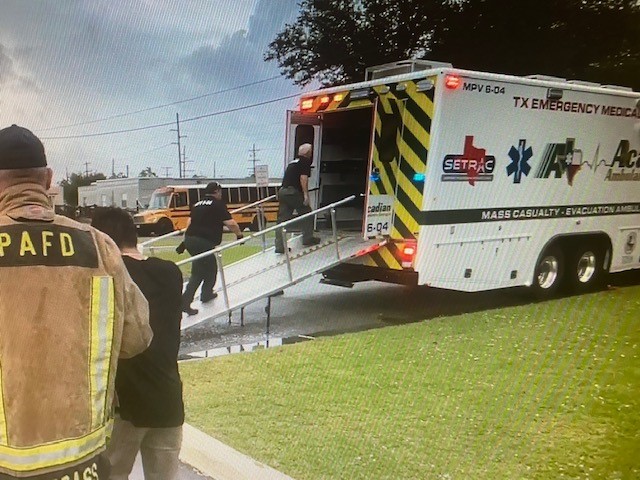 SETRAC team and EMT vehicles at a scholl in Uvalde, TX