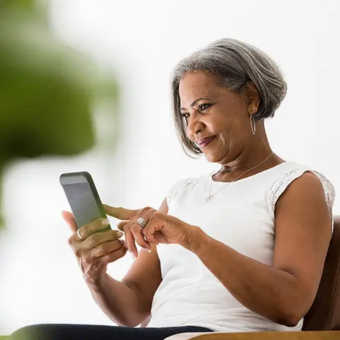 Woman using her mobile phone